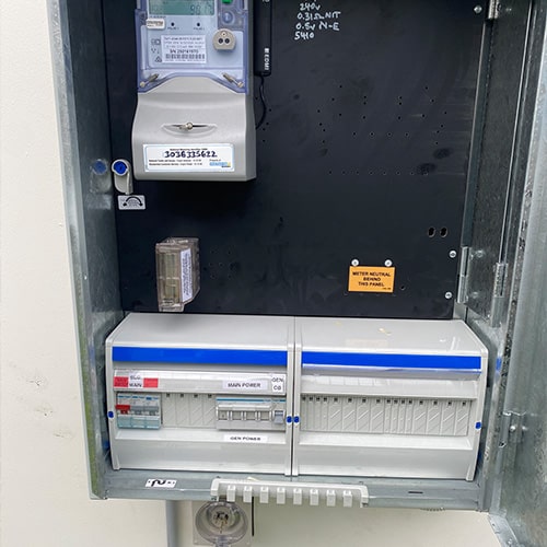 Isolated generator switches within an electrical switchboard box.